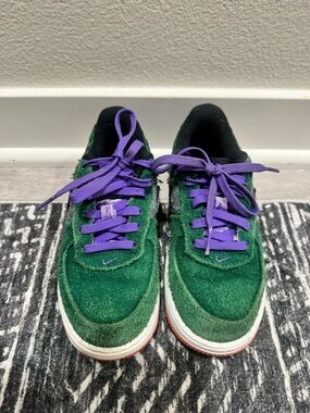 Nike Black Tongue Sneaker with Green Trim and Purple Lace Loop